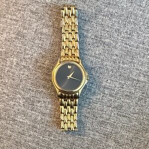 Movado Gold Watch with Black Dial